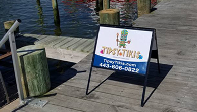tipsy tikis boat dock sign