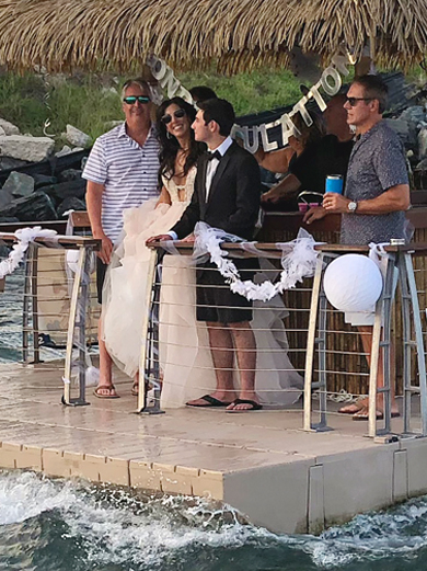 Ocean City tiki boat wedding bride